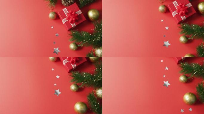 圣诞装饰与礼物和复制空间在红色的背景