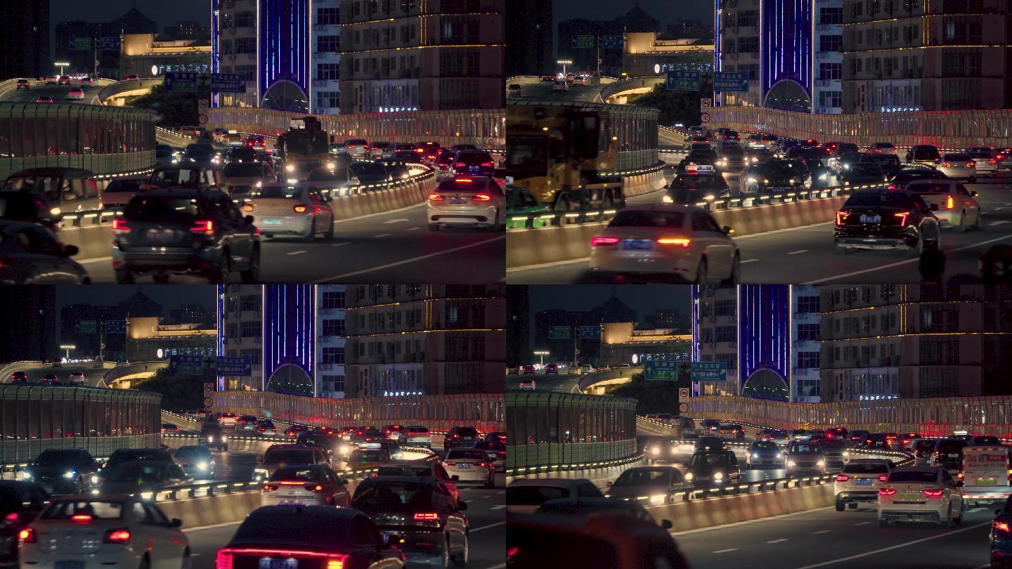 夜景车流上下班高峰堵车高架桥下坡城市交通