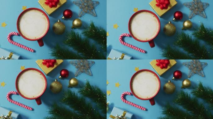 圣诞装饰的视频与咖啡和礼物在蓝色的背景