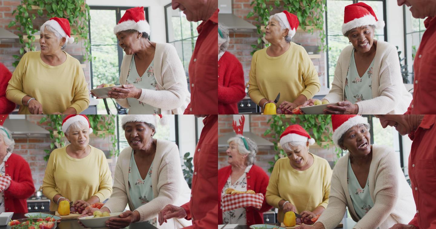 圣诞节期间，一群快乐的不同年龄的朋友在厨房里一起烹饪