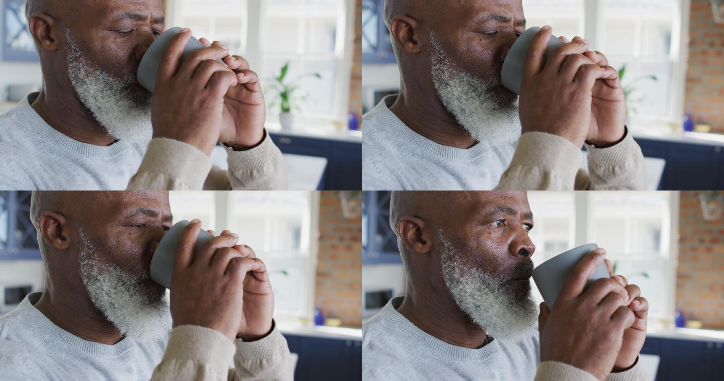 非裔美国人老人在家喝咖啡
