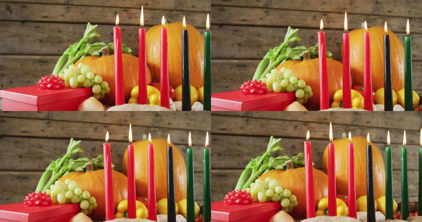 由七支点燃的蜡烛和万圣节南瓜、礼物和蔬菜组成