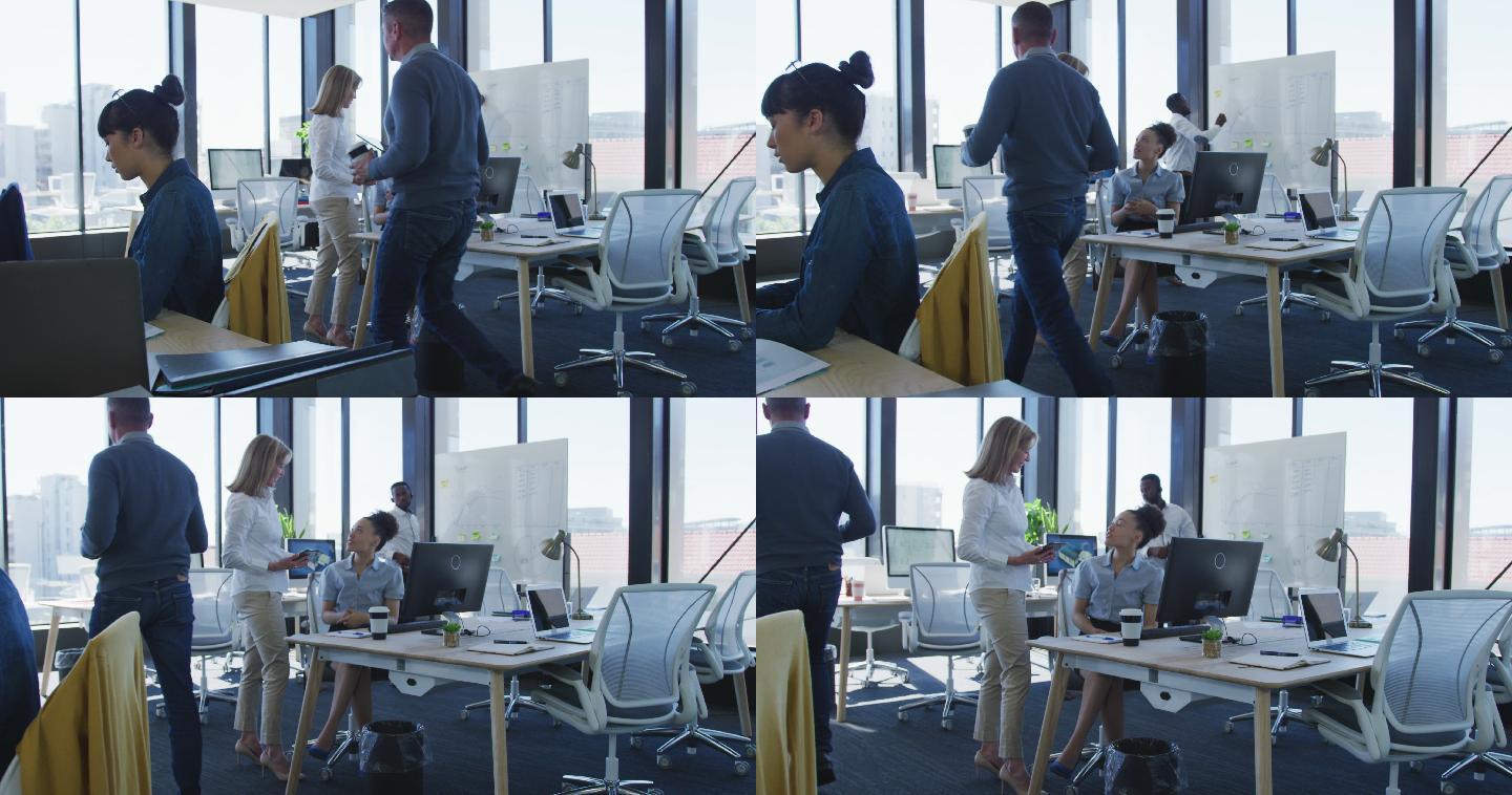 在办公室用电脑工作的女性