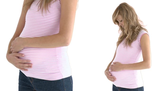 孕妇抚摸肚子特写孕检二胎三胎养胎