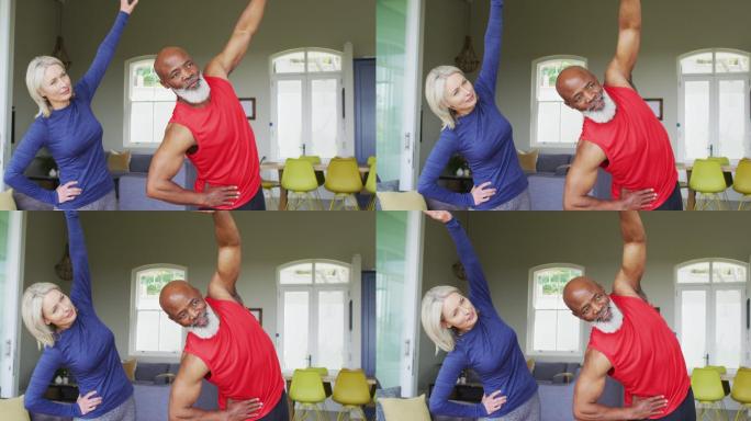 混合种族老年夫妇在家中一起做伸展运动