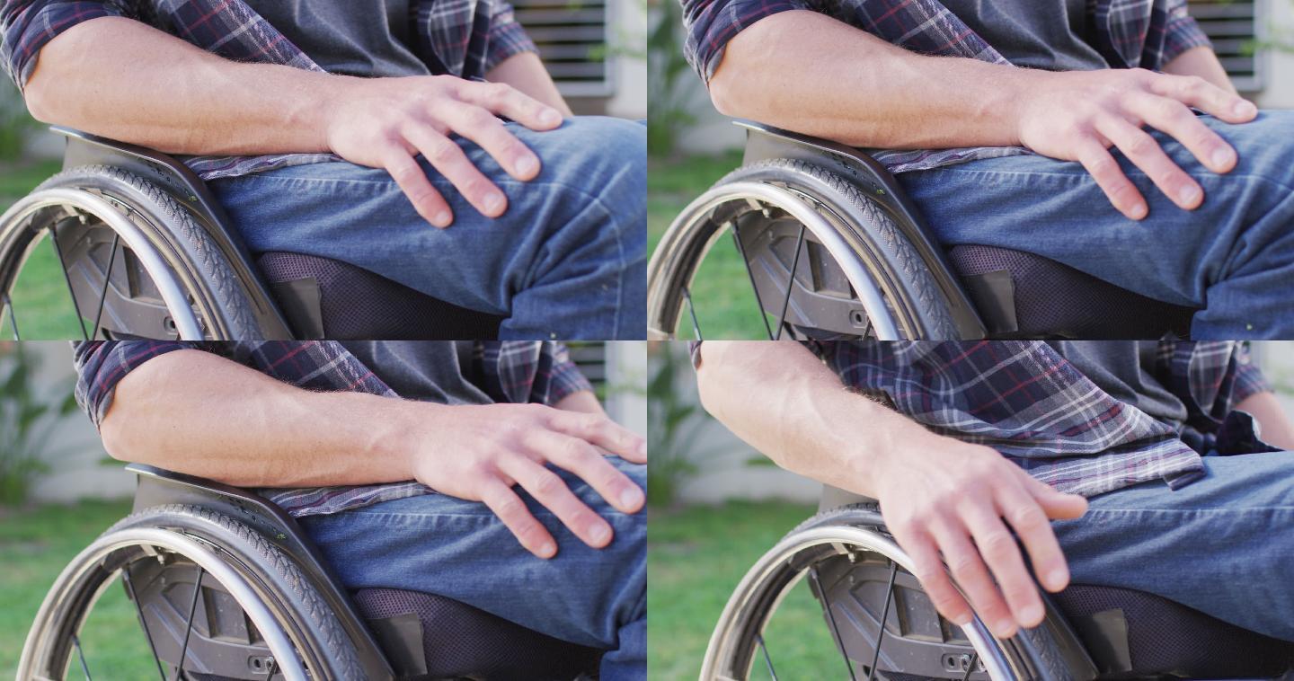 白人残疾人在街上坐轮椅的特写