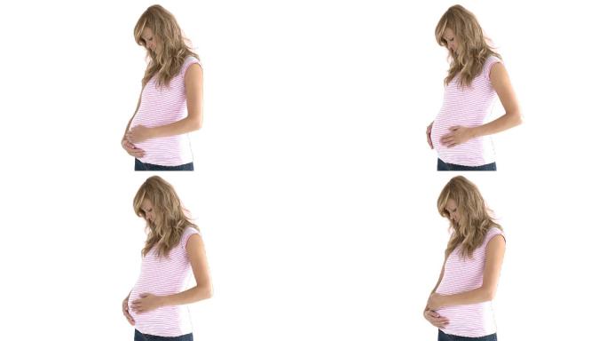 一个孕妇摸着肚子特写
