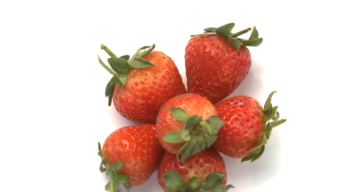 一堆草莓特写果汁果肉果脯果干展示