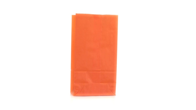 橙色的购物袋特写购物袋拍摄