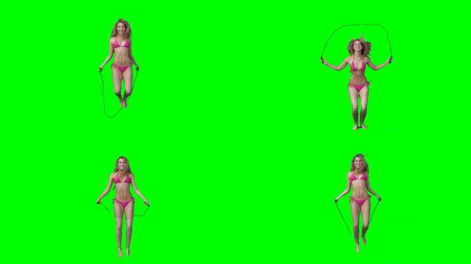 一个女人在绿色的屏幕上跳过绳子
