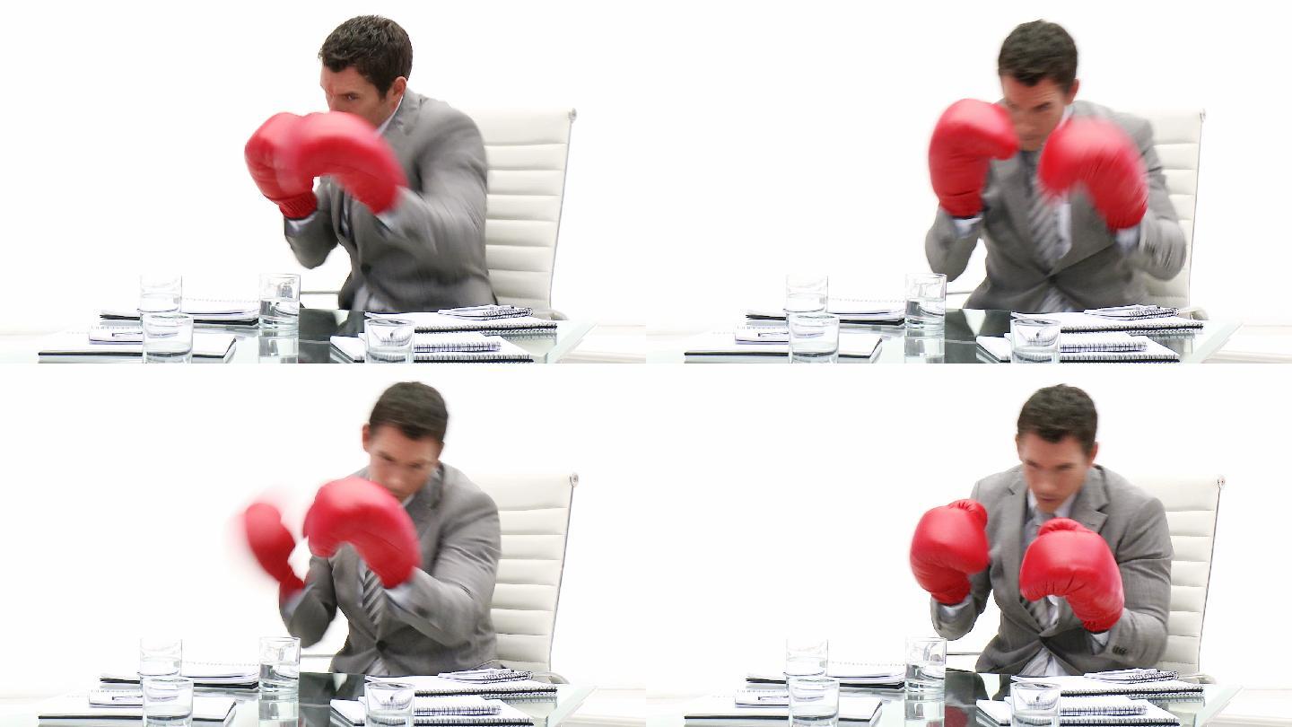 男人戴着拳击手套在办公室特写