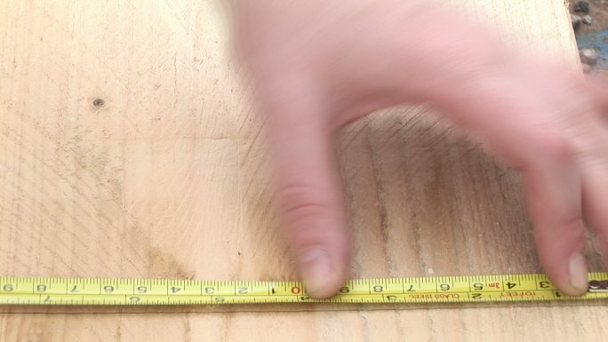 测量木板特写木工工匠