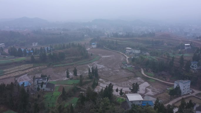 航拍清晨山村四川晨曦薄雾田野山村村落