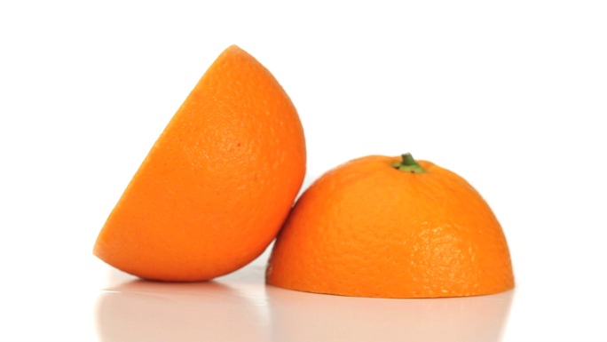 两半的橙子特写慢动作升格艺术展品物件摆拍