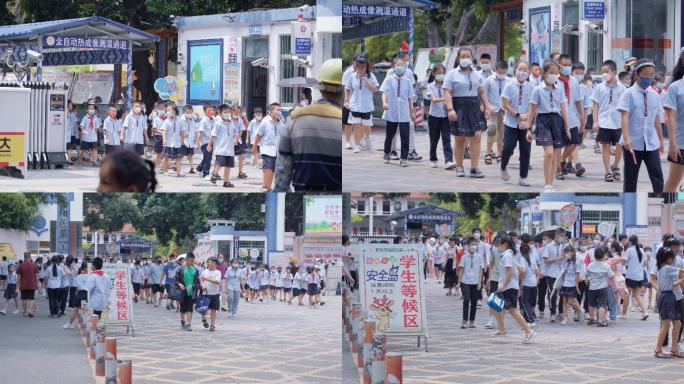 学生通过学校大门的全自动热成像测温通