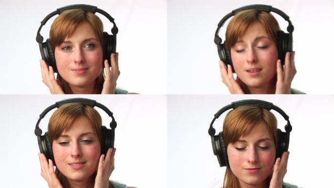 女人戴着耳机听音乐特写
