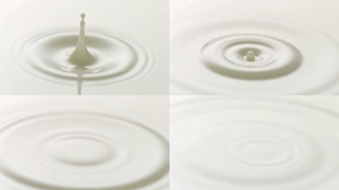 牛奶滴落特写广告素材元素牛奶滴落白色液体