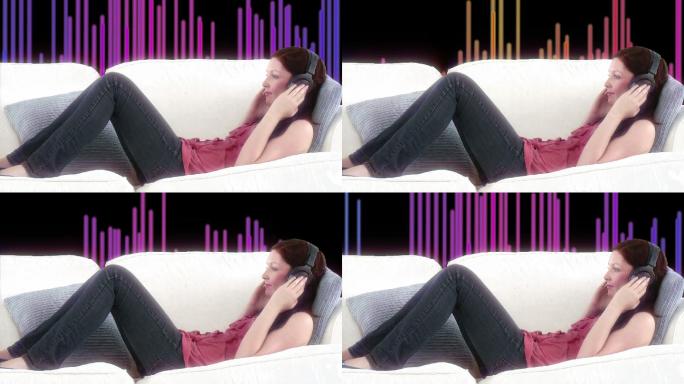 女人躺在沙发上听音乐特写