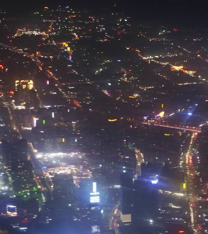 飞机舷窗外晚上现代城市深圳夜景