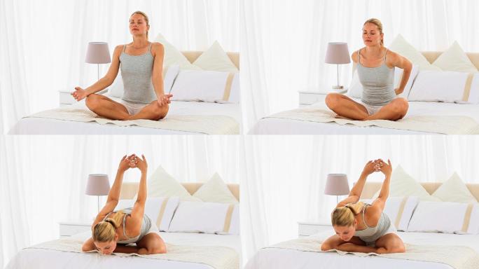 一个白人女性在床上做瑜伽