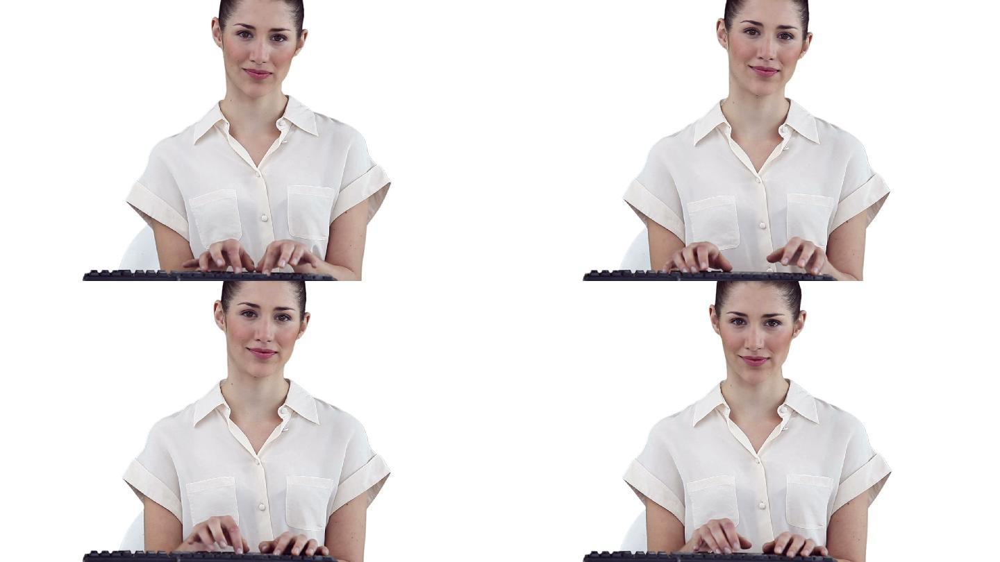 一个白人女性在键盘打字在白色背景下