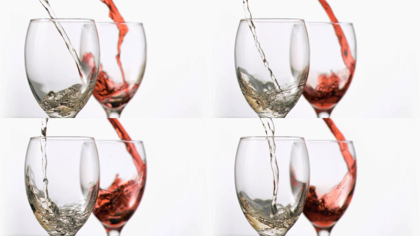 白葡萄酒和红葡萄酒以超慢的速度流入玻璃杯