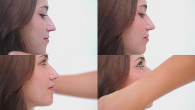 在白色的背景下，快乐的女人把头发拉直