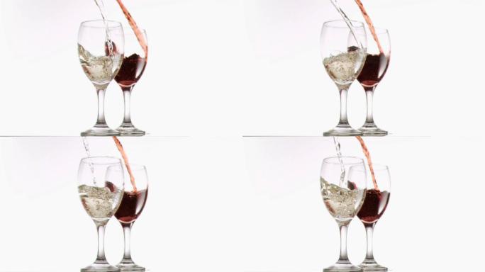 红酒和白葡萄酒以超慢的动作倒入玻璃杯中