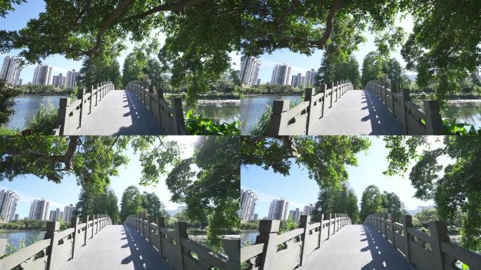 4K正版-实拍晴天阳光下的公园树荫石桥