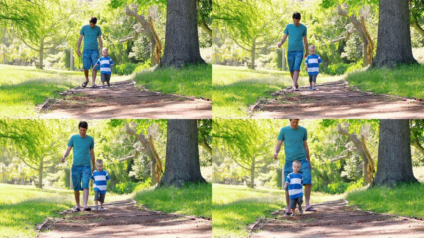 父亲和儿子在公园散步