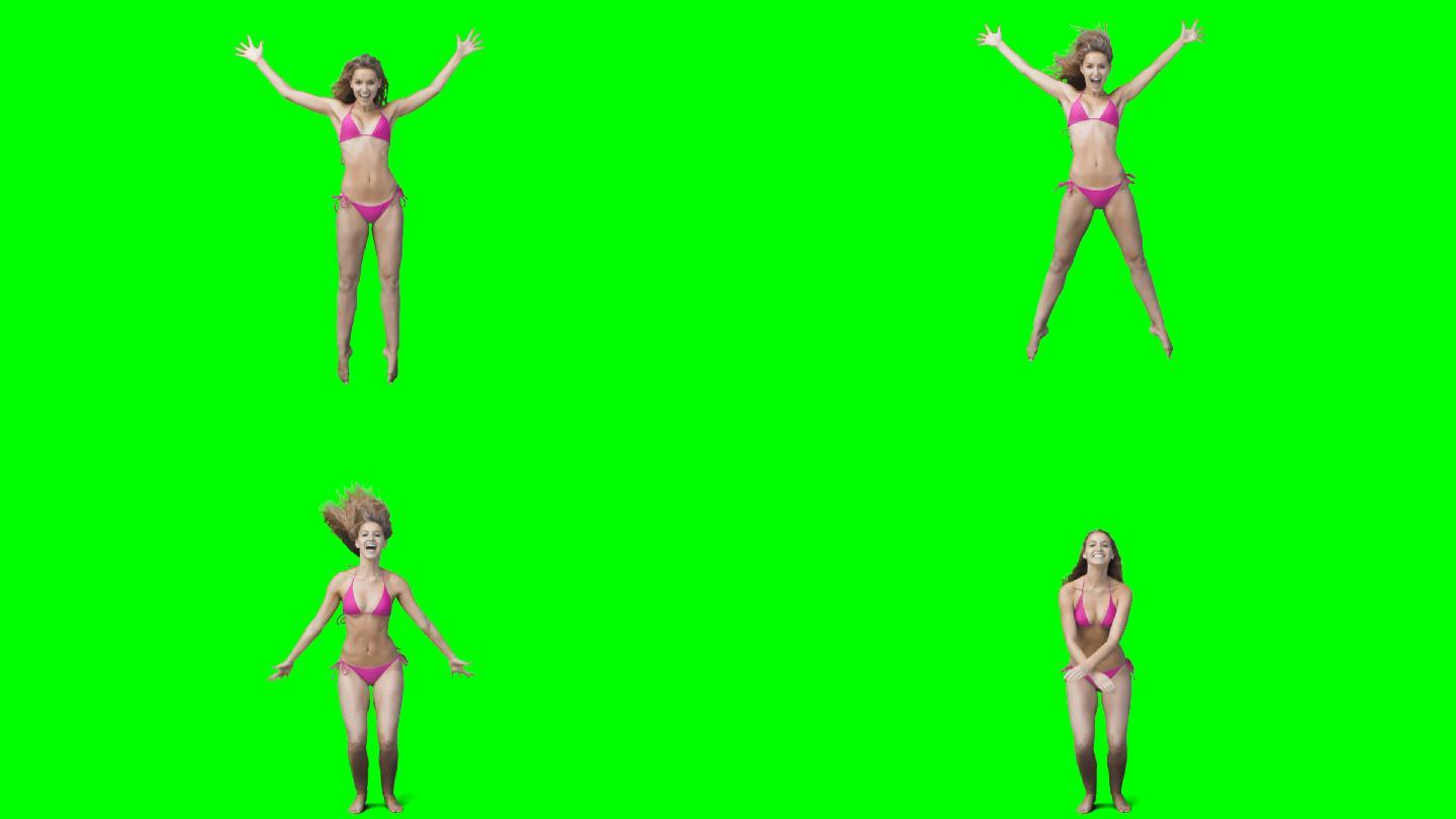 一个西方女性四肢伸展跳跃慢镜头，在绿色背景下