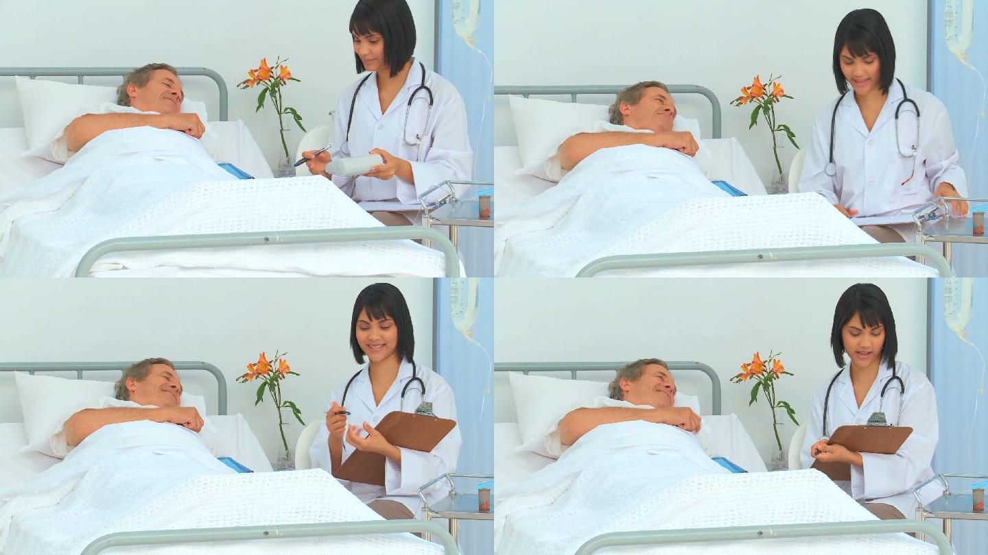 一位护士在医院给她的病人做检查