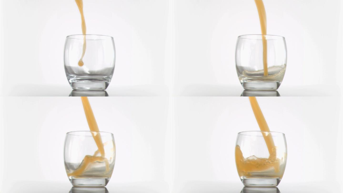 菠萝汁在玻璃杯中以超慢的动作流动