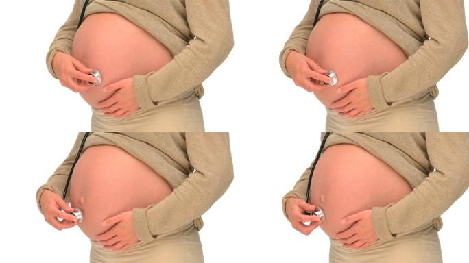 孕妇用听诊器听诊自己的腹部