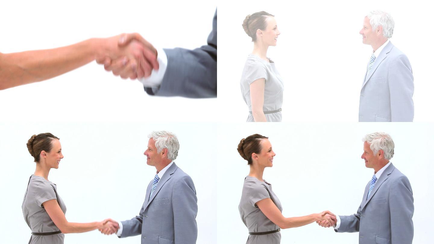 女商人在白色背景下与一位男士握手