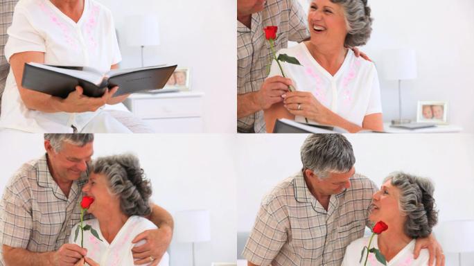 男人向成熟的妻子献上一朵玫瑰