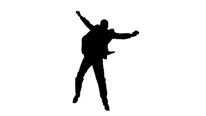 一个男人的剪影在一个白色背景的慢动作跳跃