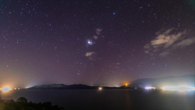 云南泸沽湖日转夜银河