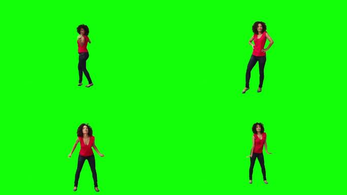 一个年轻的黑发女子在绿色背景前跳舞
