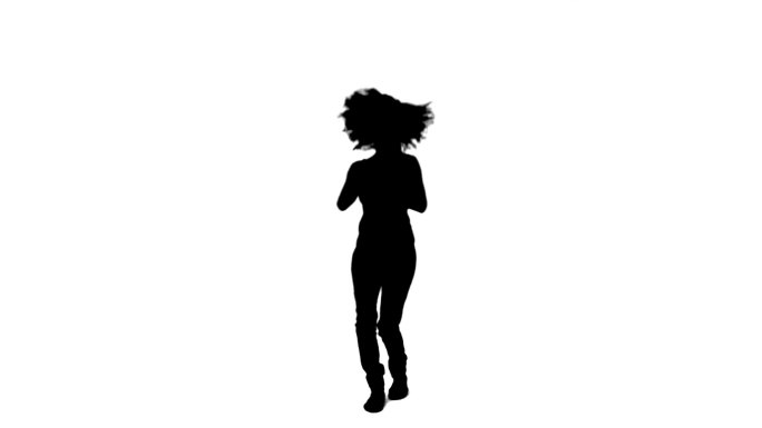 一个激动的女人在白色背景下跳舞的剪影