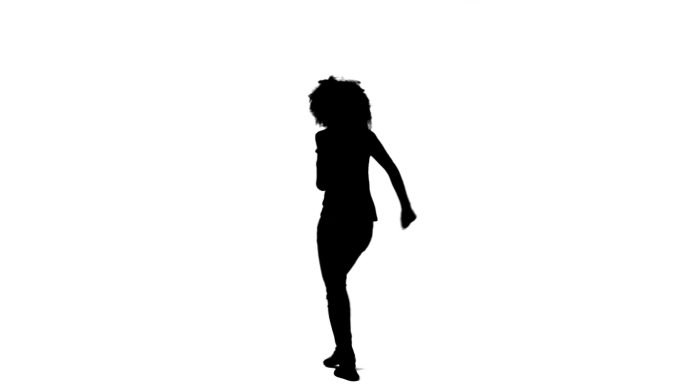 一个女人的剪影在白色的背景下随意地跳舞