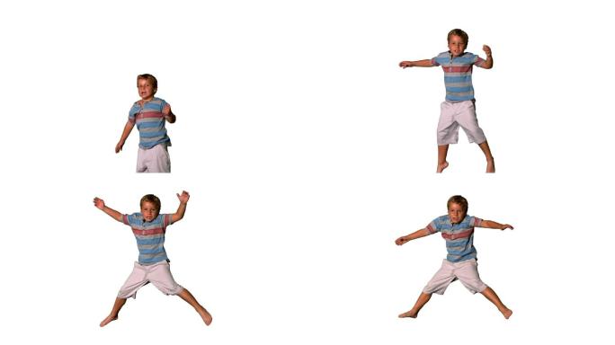 一个白人男孩四肢伸展跳跃慢镜头，在白色背景下