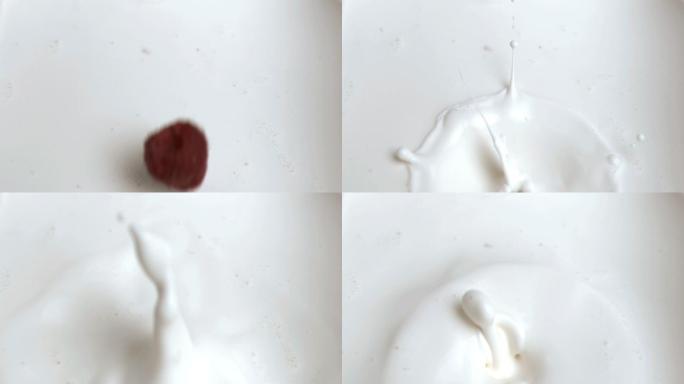 一个覆盆子的特写，用超级慢动作落在奶油酱里