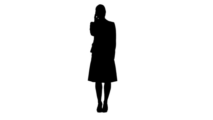 一个站着的女人在白色背景下讲手机的剪影