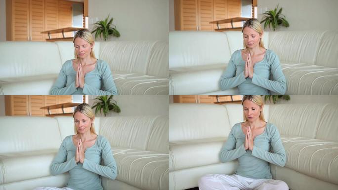 一个白人女性客厅做瑜伽移镜头