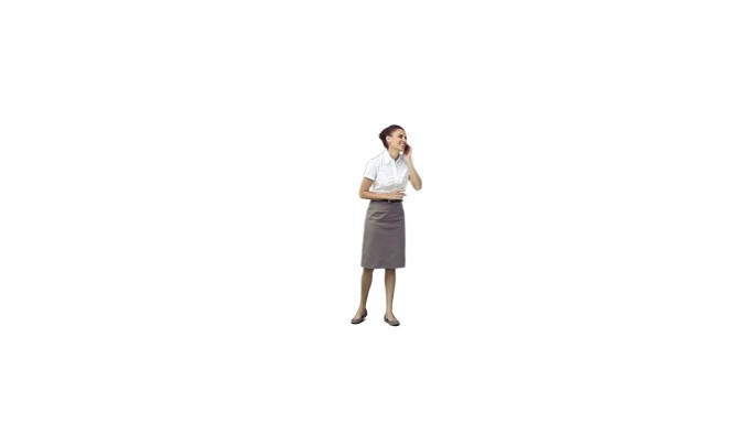 A businesswoman is talking on her phone against a 