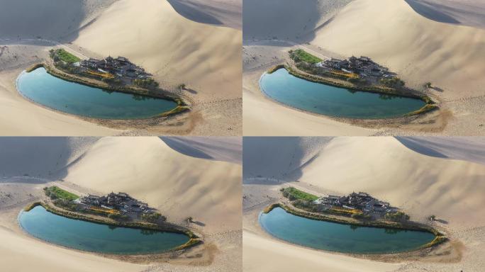 沙漠里的鸣沙山月牙泉环绕航拍特写