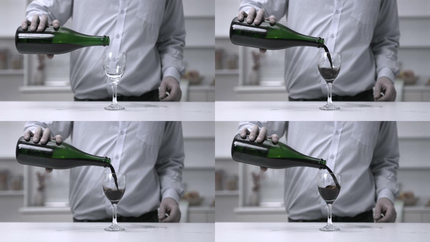 一名男子将葡萄酒倒入玻璃杯中的慢动作