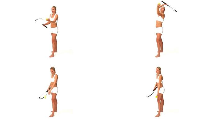 金发女子在打网球运动服装孤立在一个白色的背景