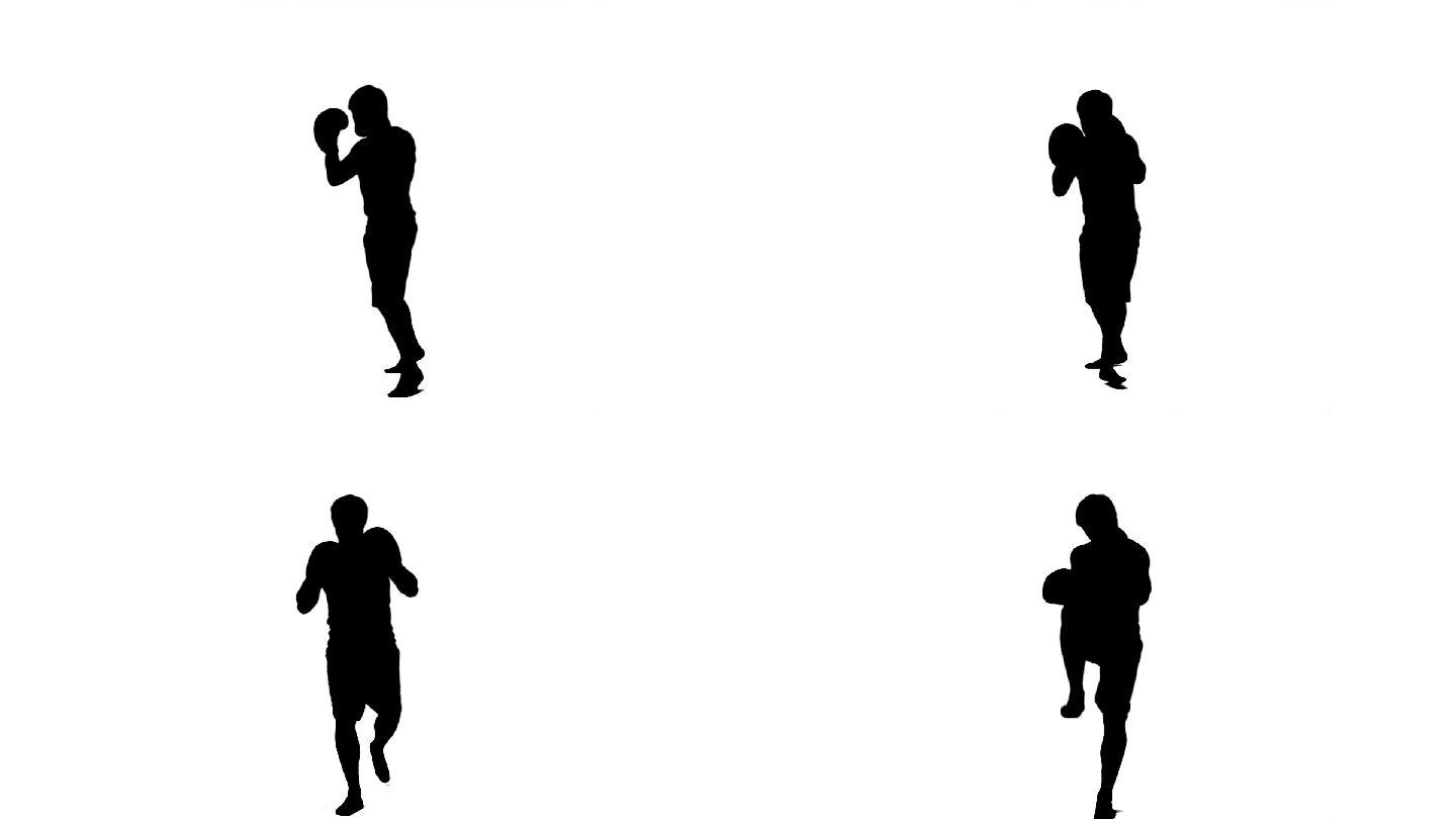 白色背景下，一个男子练习跆拳道的剪影